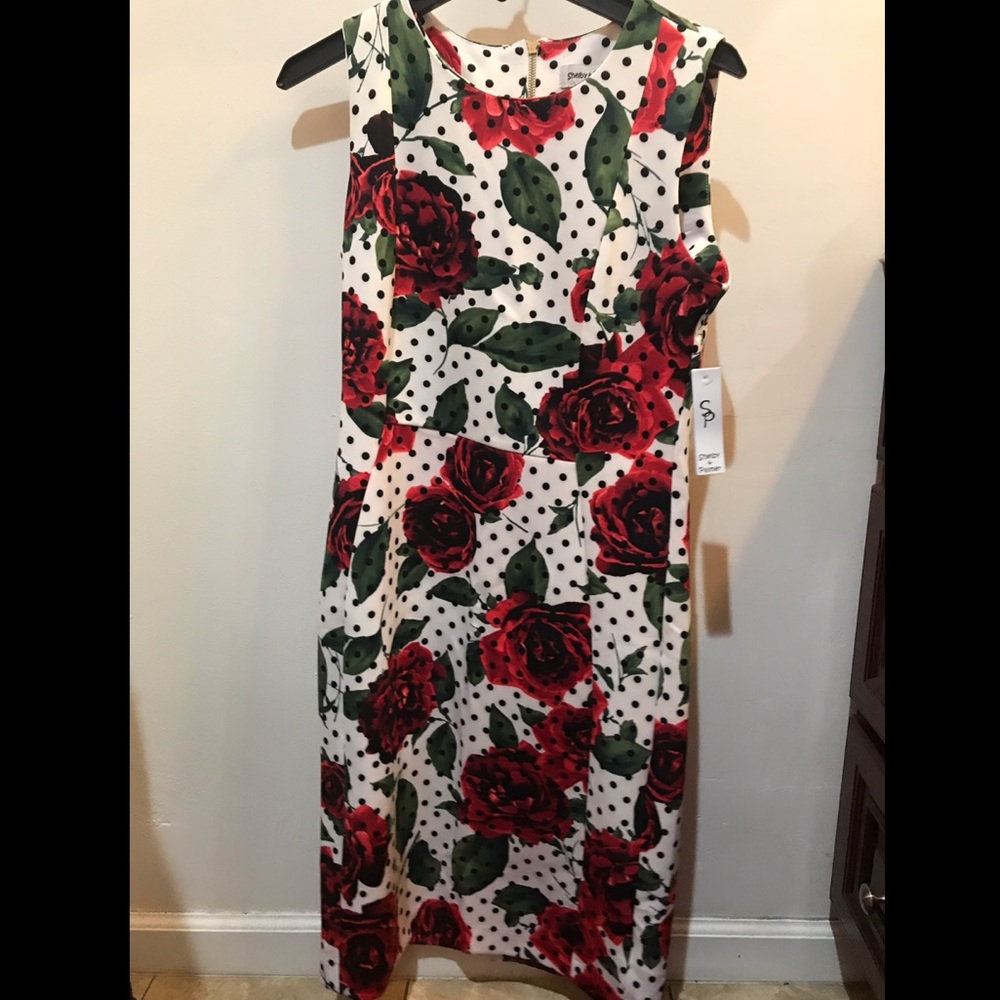 Rose patterned dress with black polka dots